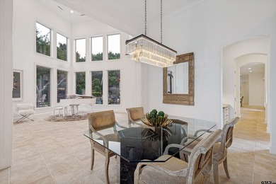 Situated in the prestigious gated community of The Lakes on - photo 4