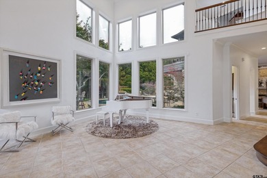 Situated in the prestigious gated community of The Lakes on - photo 5