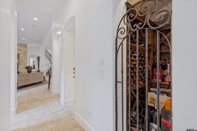 Situated in the prestigious gated community of The Lakes on - photo 7