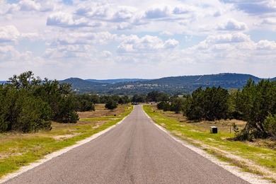 The dramatic 100-foot elevation change on this 12.96-acre tract - photo 13