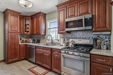 A Barnum Island beauty. This 3 Bdrm 2 Full Bath dormered raised - photo 3