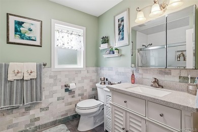 A Barnum Island beauty. This 3 Bdrm 2 Full Bath dormered raised - photo 10