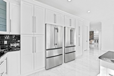 Custom Estate lakefront home in PGA Village. Experience refined - photo 11