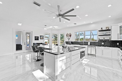 Custom Estate lakefront home in PGA Village. Experience refined - photo 12