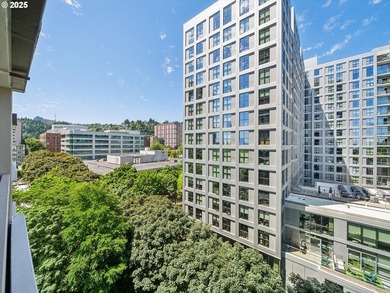 Meticulously maintained condo at Harrison West. Unit 9C is a