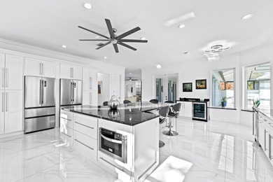 Custom Estate lakefront home in PGA Village. Experience refined - photo 13