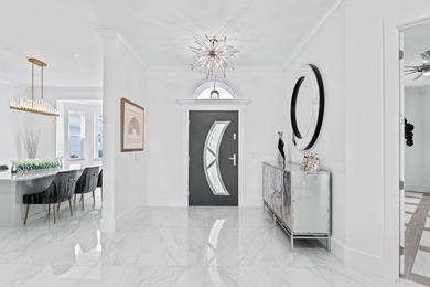 Custom Estate lakefront home in PGA Village. Experience refined - photo 20