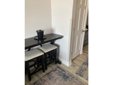 Carpet and wood floors; king bed and large sofa. Updated unit - photo 6