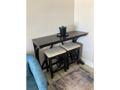 Carpet and wood floors; king bed and large sofa. Updated unit - photo 9