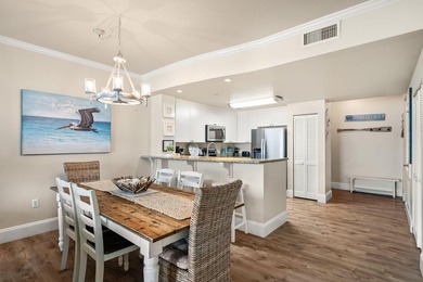 Wake up to breathtaking Gulf views from this beautifully updated - photo 3