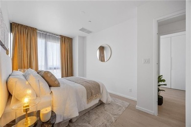 Residence 6B at Bayview Courtyard offers a bright and modern - photo 15