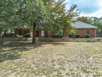 Lake Home For Sale in Runaway Bay, Texas