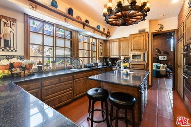 Welcome to this magnificent Spanish-style estate in the - photo 11