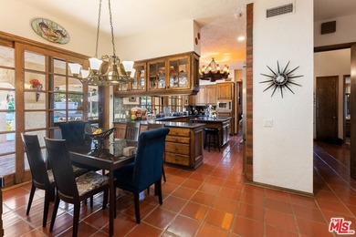 Welcome to this magnificent Spanish-style estate in the - photo 13