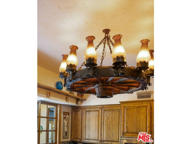 Welcome to this magnificent Spanish-style estate in the - photo 14