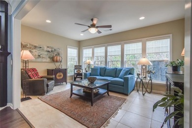 Welcome to this beautifully maintained four-bedroom, three-bath