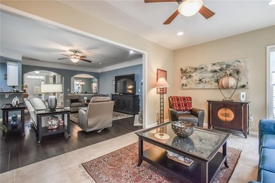 Welcome to this beautifully maintained four-bedroom, three-bath