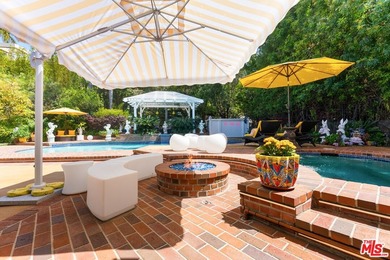 Welcome to this magnificent Spanish-style estate in the - photo 17