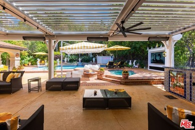 Welcome to this magnificent Spanish-style estate in the - photo 18