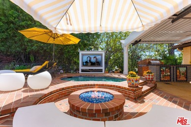 Welcome to this magnificent Spanish-style estate in the - photo 19