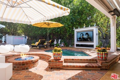 Welcome to this magnificent Spanish-style estate in the - photo 20
