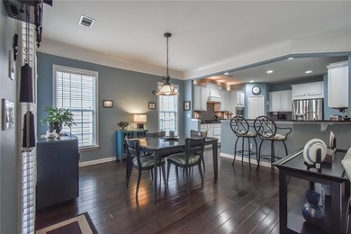 Welcome to this beautifully maintained four-bedroom, three-bath