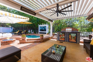 Welcome to this magnificent Spanish-style estate in the - photo 21