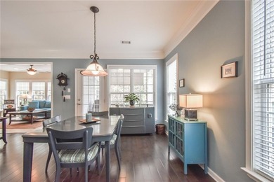 Welcome to this beautifully maintained four-bedroom, three-bath