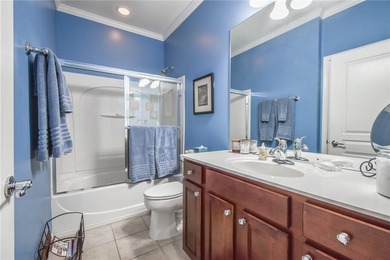 Welcome to this beautifully maintained four-bedroom, three-bath