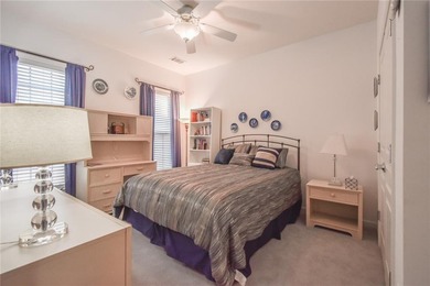 Welcome to this beautifully maintained four-bedroom, three-bath