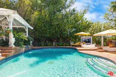 Welcome to this magnificent Spanish-style estate in the - photo 24