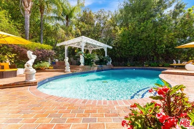 Welcome to this magnificent Spanish-style estate in the - photo 25
