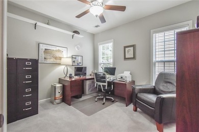 Welcome to this beautifully maintained four-bedroom, three-bath