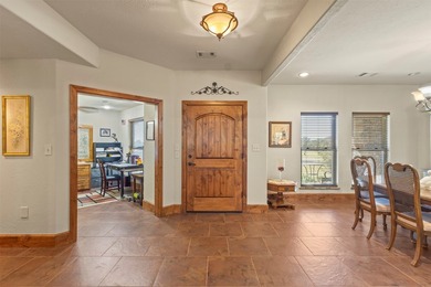 Welcome to this impressive custom home in the gated Texoma - photo 5