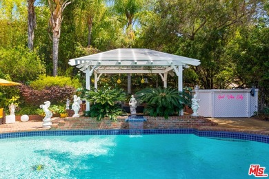 Welcome to this magnificent Spanish-style estate in the - photo 26
