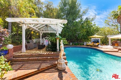 Welcome to this magnificent Spanish-style estate in the - photo 27