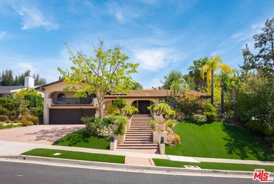Welcome to this magnificent Spanish-style estate in the - photo 28