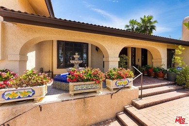 Welcome to this magnificent Spanish-style estate in the - photo 31