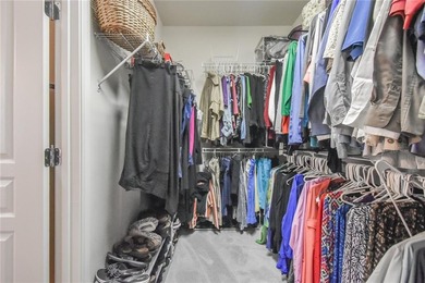 Welcome to this beautifully maintained four-bedroom, three-bath