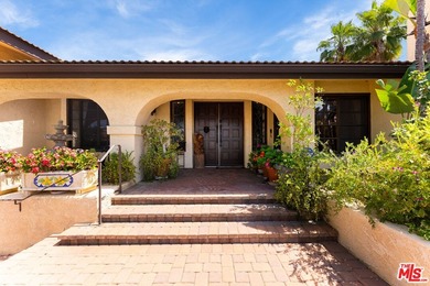 Welcome to this magnificent Spanish-style estate in the - photo 32
