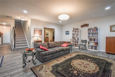 Welcome to this beautifully maintained four-bedroom, three-bath