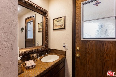 Welcome to this magnificent Spanish-style estate in the - photo 35
