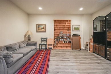 Welcome to this beautifully maintained four-bedroom, three-bath