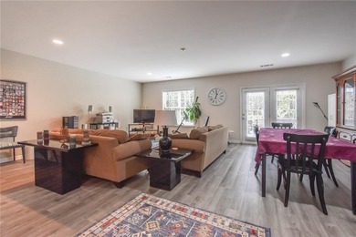 Welcome to this beautifully maintained four-bedroom, three-bath