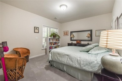 Welcome to this beautifully maintained four-bedroom, three-bath