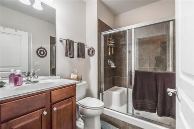 Welcome to this beautifully maintained four-bedroom, three-bath