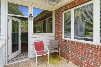 Set among mature trees on a quiet street, this brick traditional - photo 40