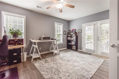 Welcome to this beautifully maintained four-bedroom, three-bath