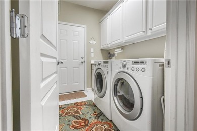 Welcome to this beautifully maintained four-bedroom, three-bath