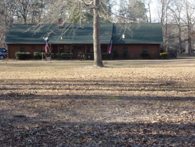 Very unique,waterfront log cabin sitting on just under 5 acres - Lake Home Off Market in Hemphill, Texas